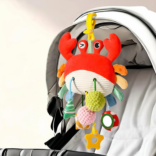 Soft red crab stroller toy with pull mechanism, colorful textures, mirror, and star teether.