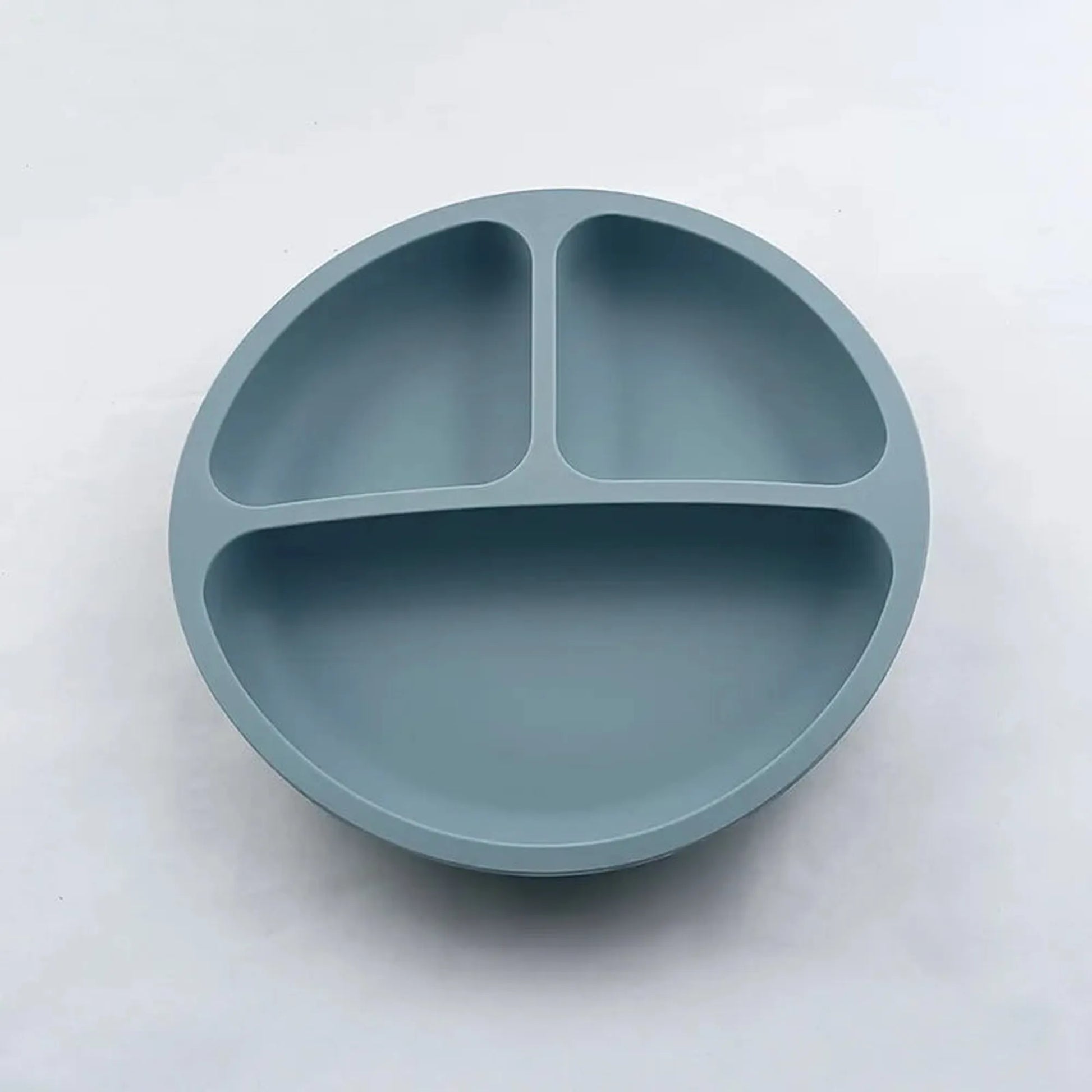 Blue silicone suction plate for babies with three divided sections.