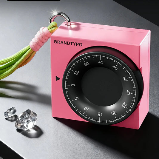 Pink square visual timer with black dial, 60-minute countdown, and a colorful strap.