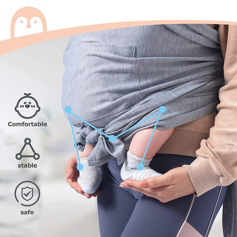 Gray X-type ergonomic cotton baby carrier, showing a baby's legs wrapped for comfort and stability.