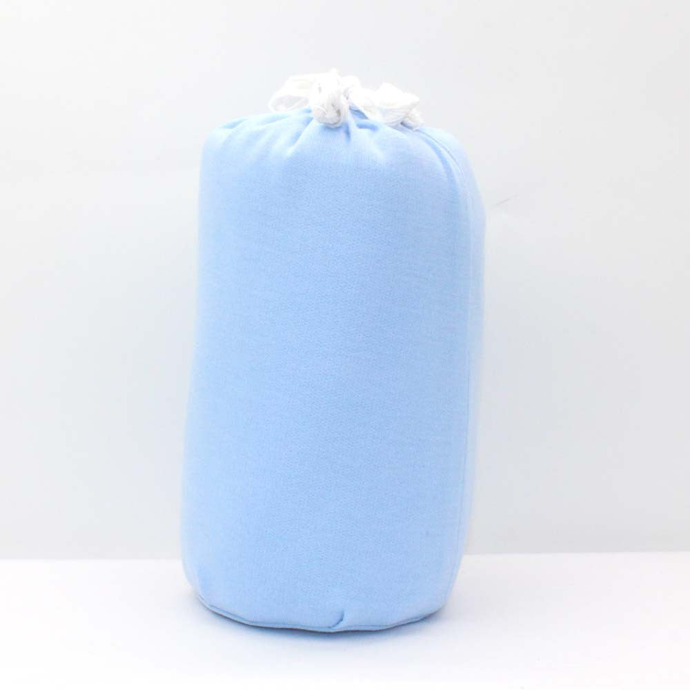 Soft blue cotton baby wrap carrier, rolled and tied with white string, on a white background.