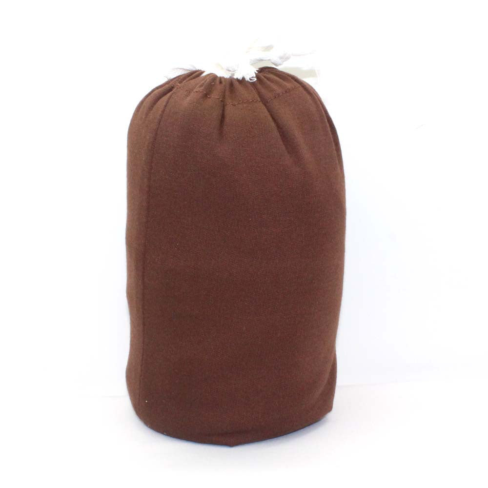 Soft brown cotton baby wrap carrier, neatly folded and tied with white strings.