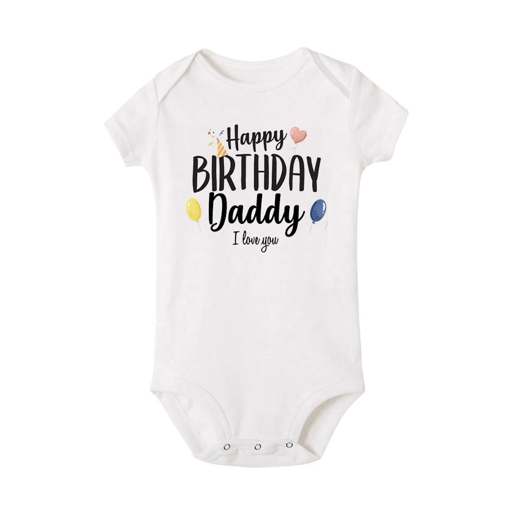 White short-sleeve baby bodysuit with "Happy Birthday Daddy I love you" text and balloons.