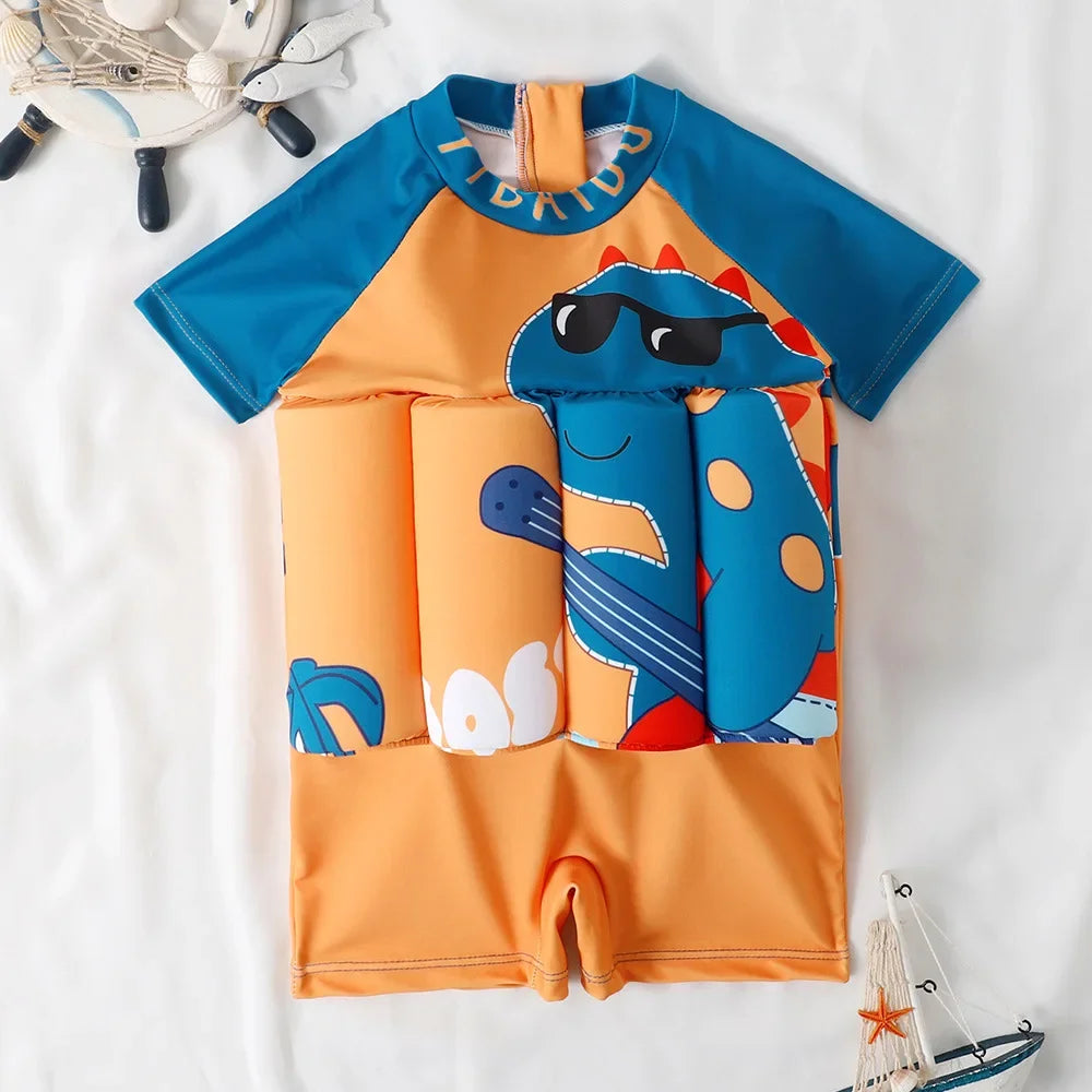 Kids' orange and blue floatation swimsuit with a cool cartoon dinosaur print and short sleeves.