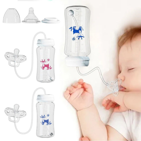 Clear 3-in-1 BPA-free baby bottle with gravity ball, wide neck, and pacifier attachment, shown with sleeping baby.