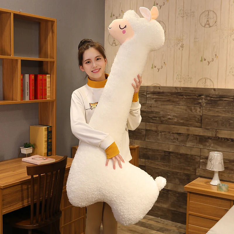 Soft white alpaca plush pillow, 100cm, held by a woman, perfect for kids' hugs.