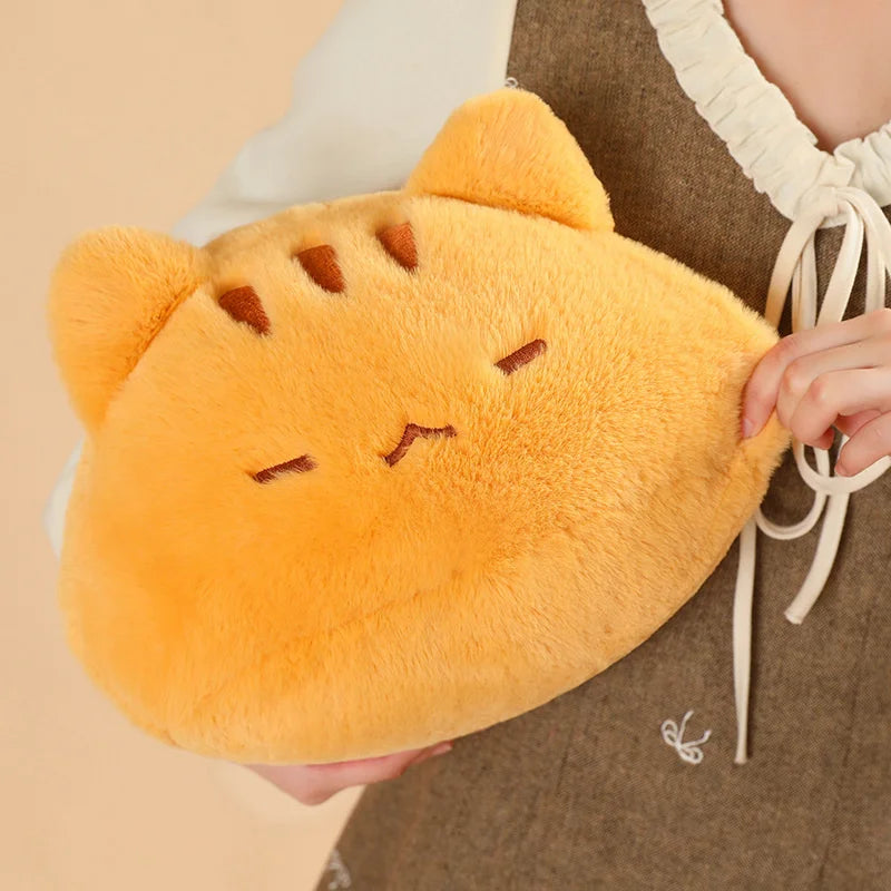 Soft orange furry cat plush pillow, 45cm, held by a person.