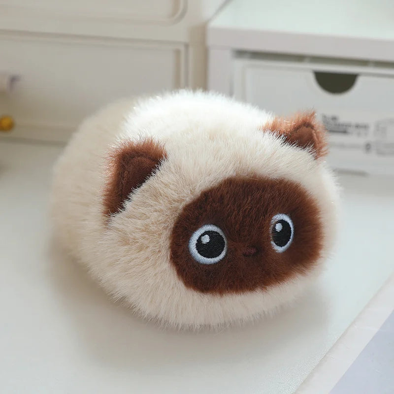 Soft, fluffy cream and brown cat plush toy with embroidered eyes, 20-23cm.