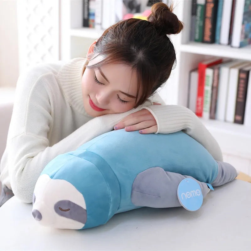 Soft blue plush sloth toy, 65-100cm, with a woman resting her head on it.