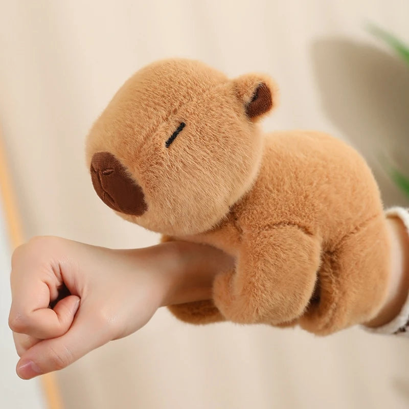 Soft brown capybara plush toy, 20cm, held on a hand, perfect for babies.