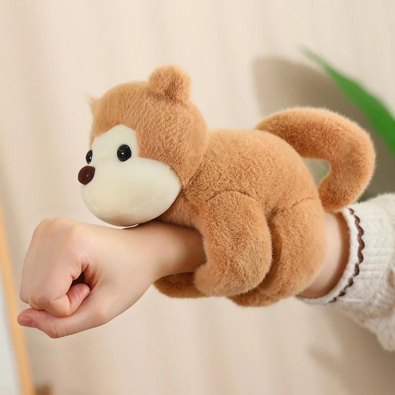 Soft brown plush monkey toy, 20cm, designed to wrap around a baby's arm or stroller.