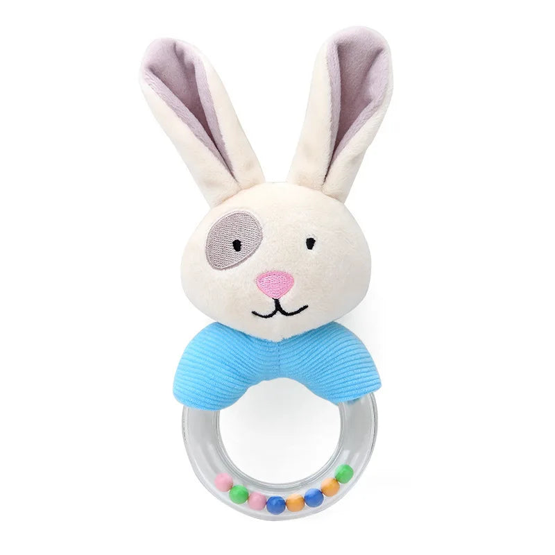 Soft white plush bunny rattle with pink nose, gray eye patch, blue collar, and clear teether ring with colorful beads.
