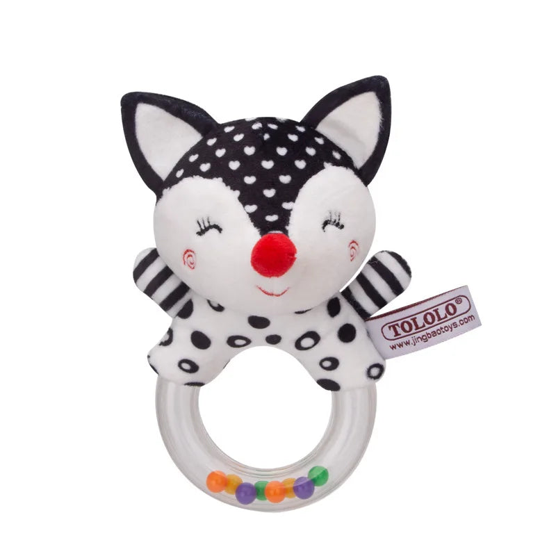 Black and white plush fox baby rattle and teether with a clear ring and colorful beads.