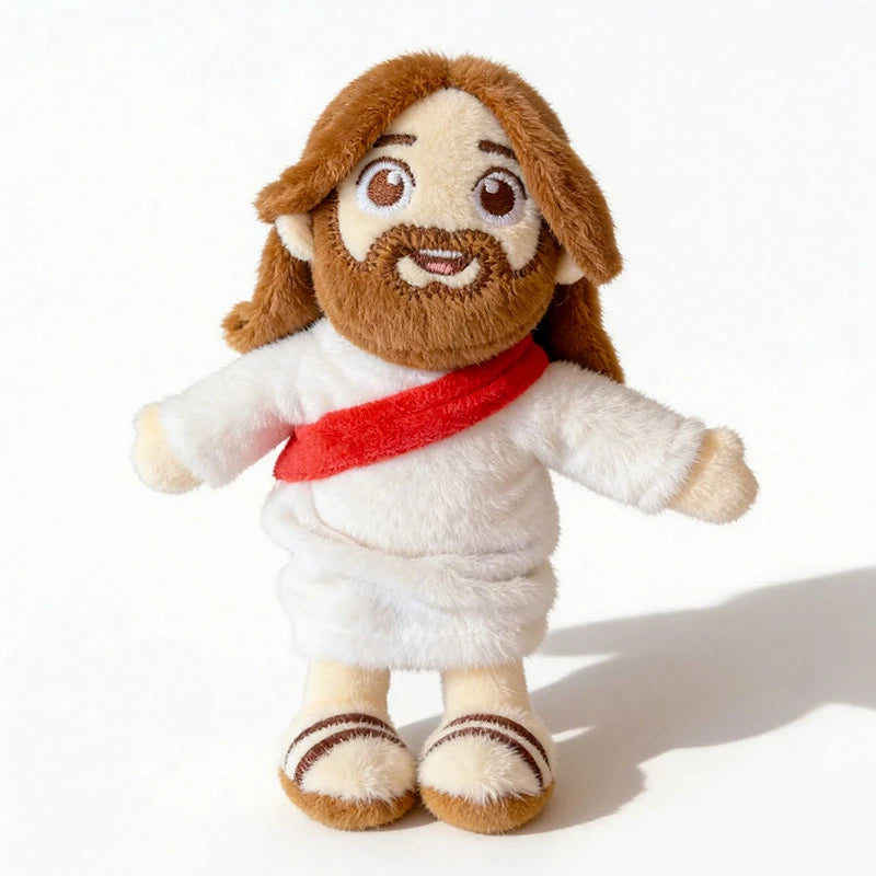 Plush magnetic shoulder doll of Jesus with brown hair, beard, white robe, and red sash.