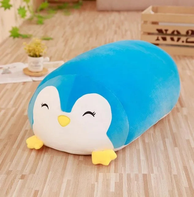 Soft blue plush penguin pillow, 20-90cm, with white belly, yellow beak and feet, and closed eyes.