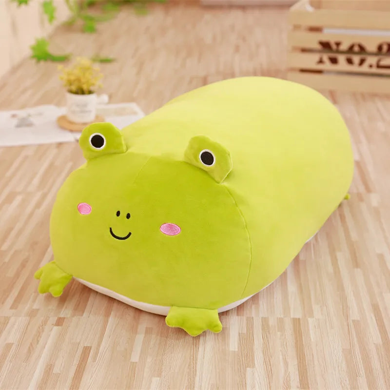 Soft plush green frog animal pillow for babies, with pink cheeks and a gentle smile.