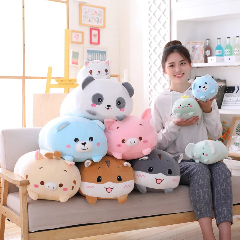 Soft plush animal toys in various colors and sizes, including a panda, pig, bear, and elephant.