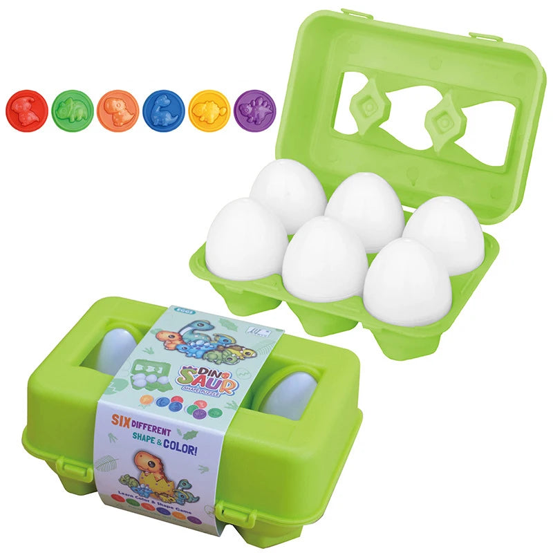 Green plastic egg carton with six white Montessori matching eggs, plus six colorful dinosaur shape inserts.