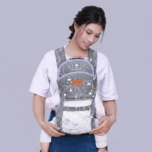 Gray ergonomic baby carrier with dog print, breathable mesh, and removable guard plate.