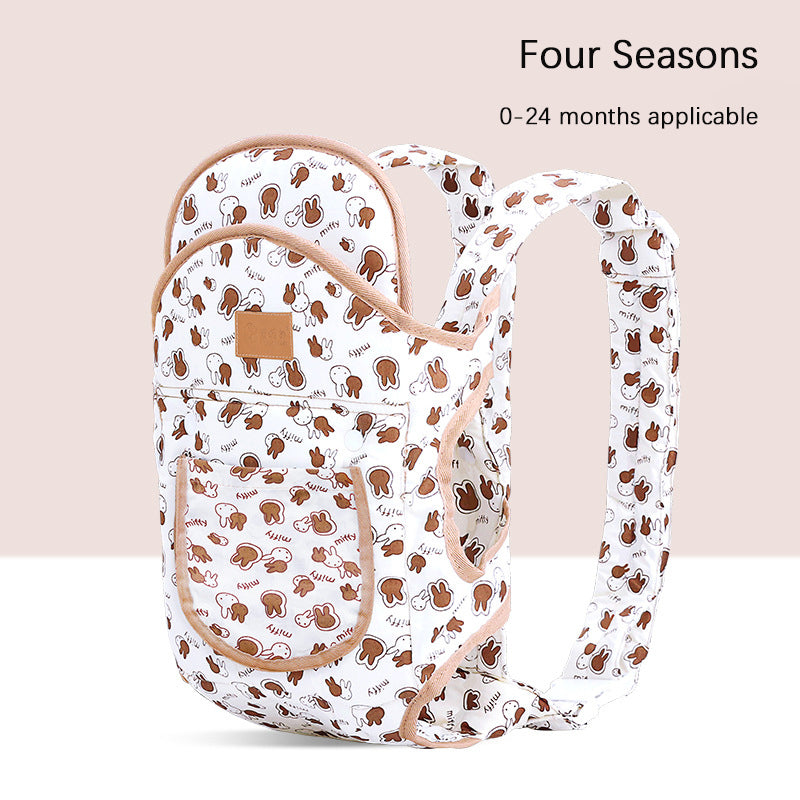White ergonomic baby carrier with brown Miffy bunny print, padded straps, and tan trim.