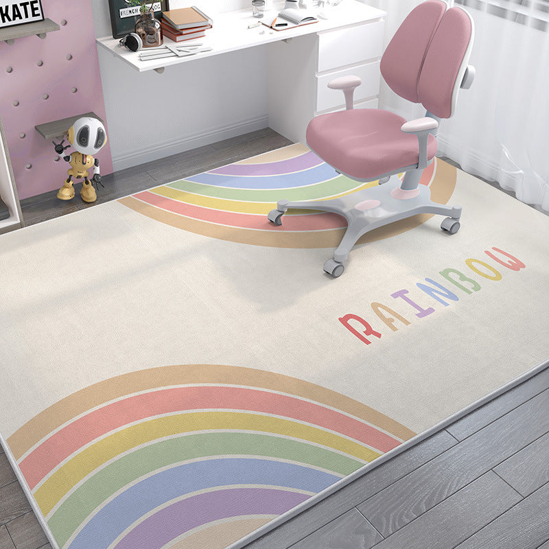 Soft crystal velvet kids' rug with a pastel rainbow design and "RAINBOW" text.