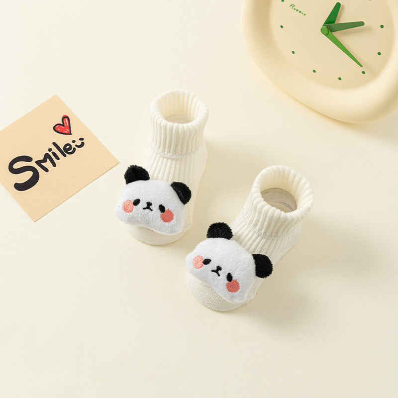 White cotton baby socks with cute panda design and anti-slip soles.