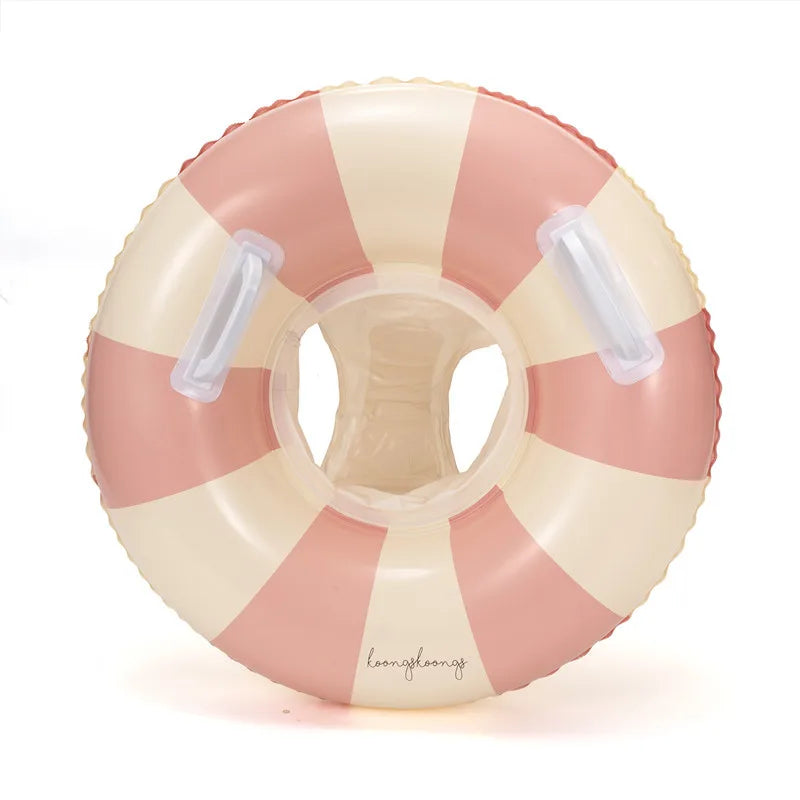 Pink and cream striped inflatable baby swim float with seat and two white handles.