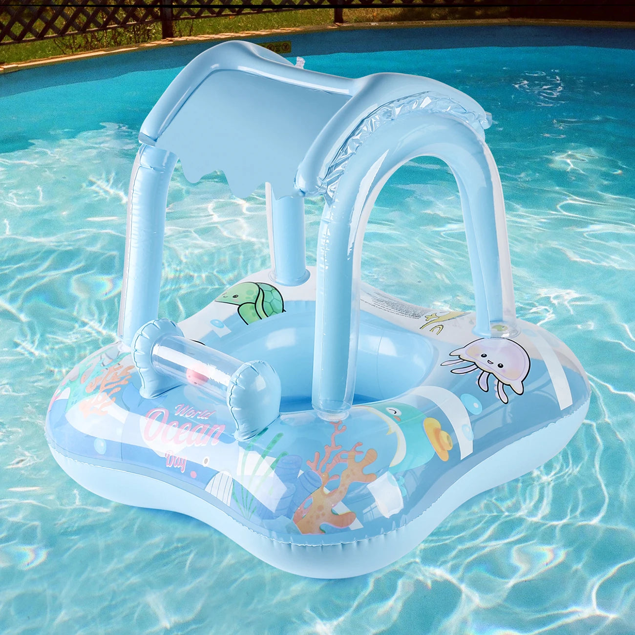 Blue inflatable kids' swim float with sun canopy, ocean animal graphics, and steering wheel in a pool.