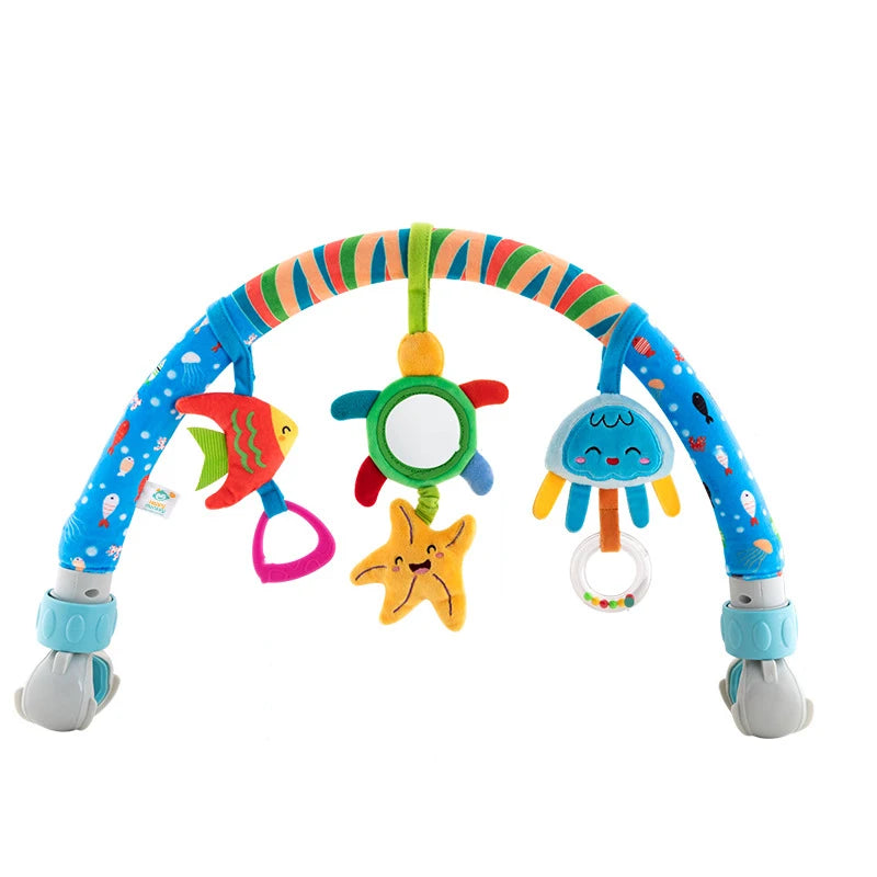 Adjustable baby activity arch with colorful sea creature plush toys, mirror, and rattle.