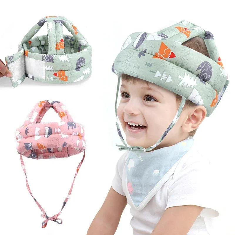 Adjustable green forest-print baby safety helmet on a child, with pink and green versions shown.