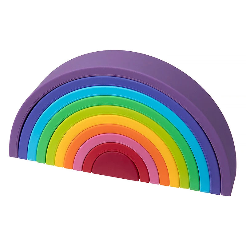Colorful soft silicone rainbow stacking toy for babies, featuring arch-shaped blocks in various bright colors.