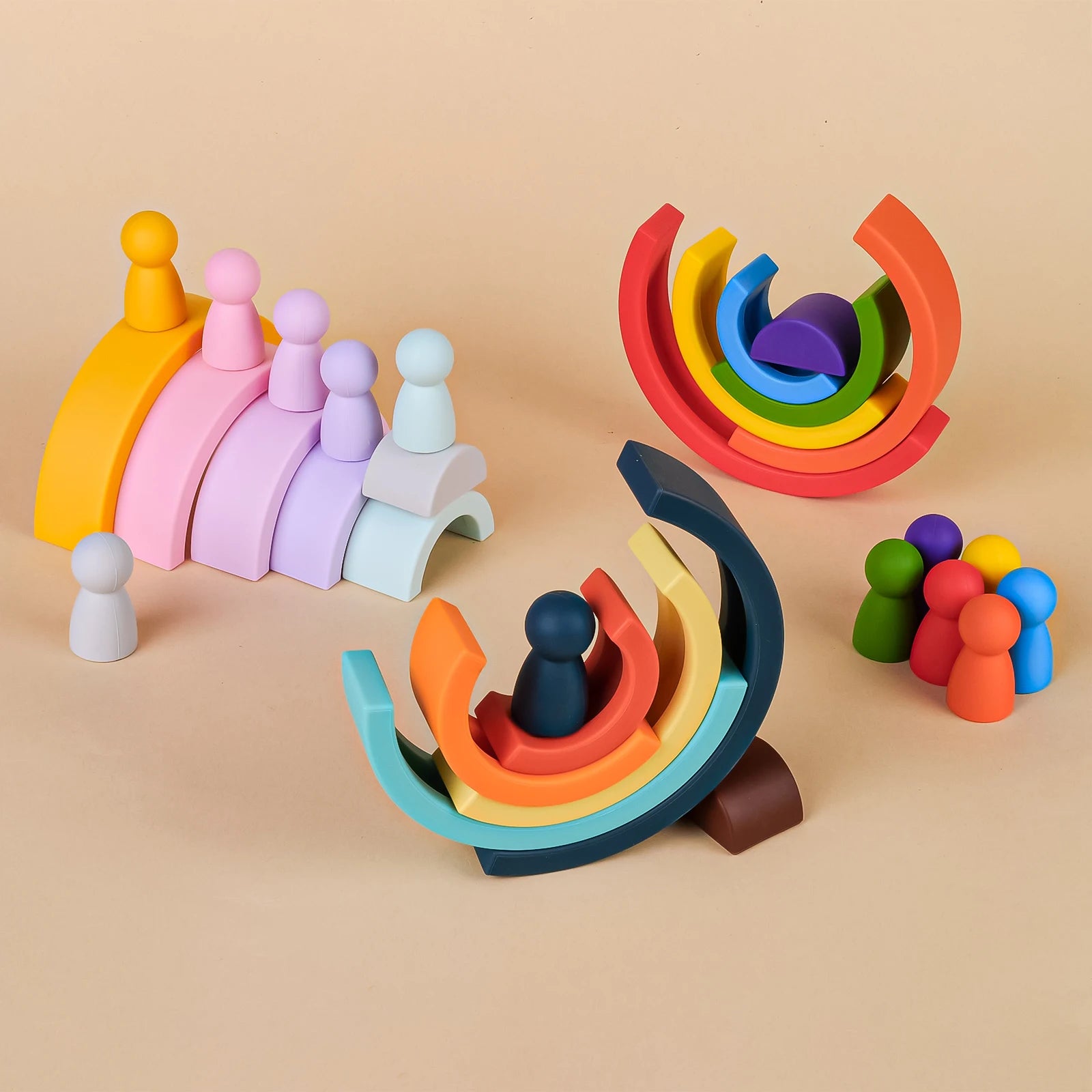 Colorful Montessori wooden rainbow stackers and peg dolls for toddlers.