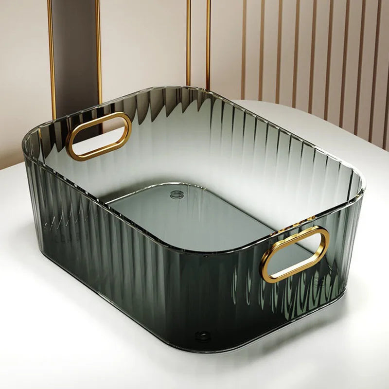 Clear rectangular PET storage box with ribbed design and gold handles.