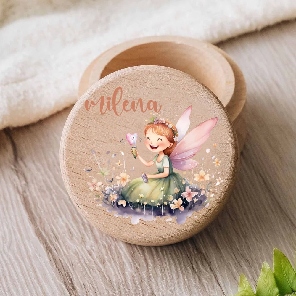 Personalized wooden tooth fairy box with a smiling fairy design and "Milena" engraved on the lid.