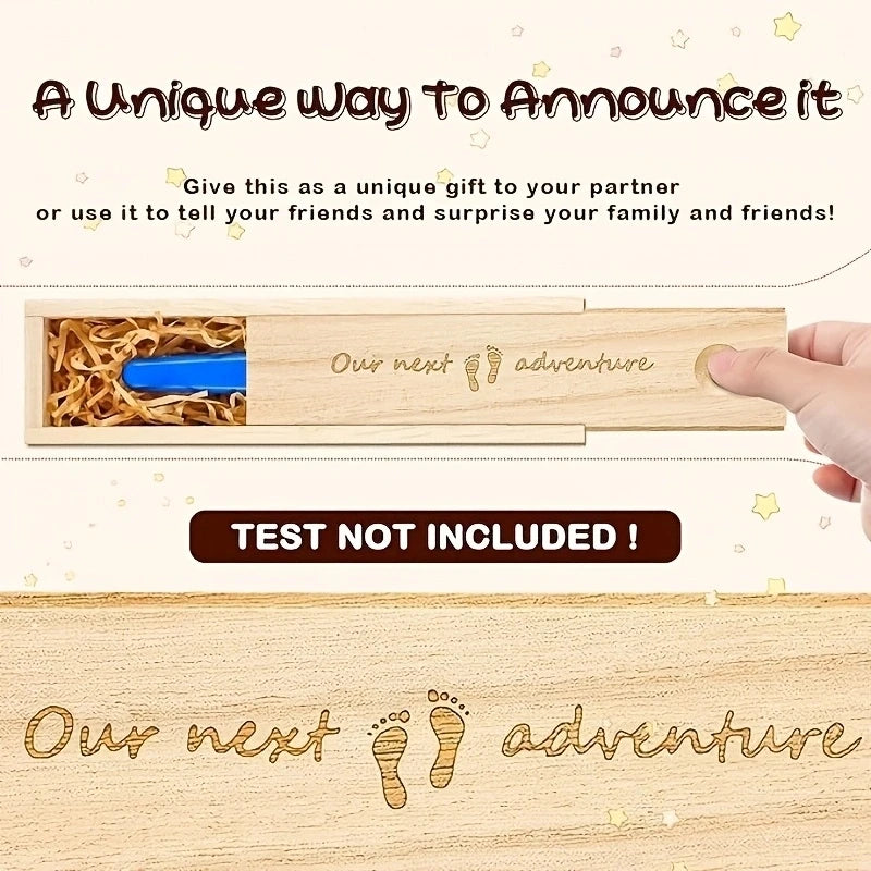 Wooden pregnancy test display box with "Our next adventure" engraving and footprint design.