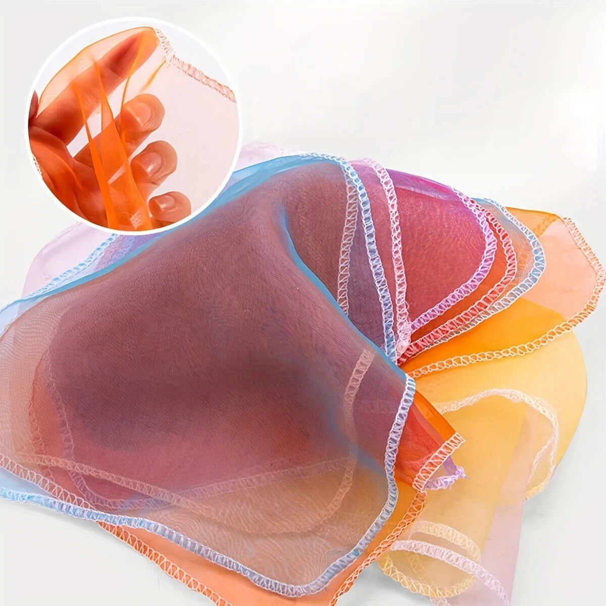 Colorful, soft sensory play scarves for babies and toddlers, with a close-up of the sheer fabric.