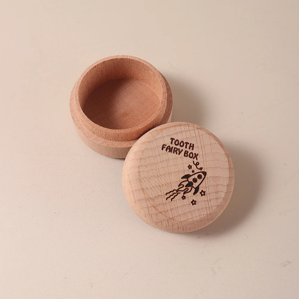 Natural beechwood tooth fairy box with a rocket and stars design on the lid.