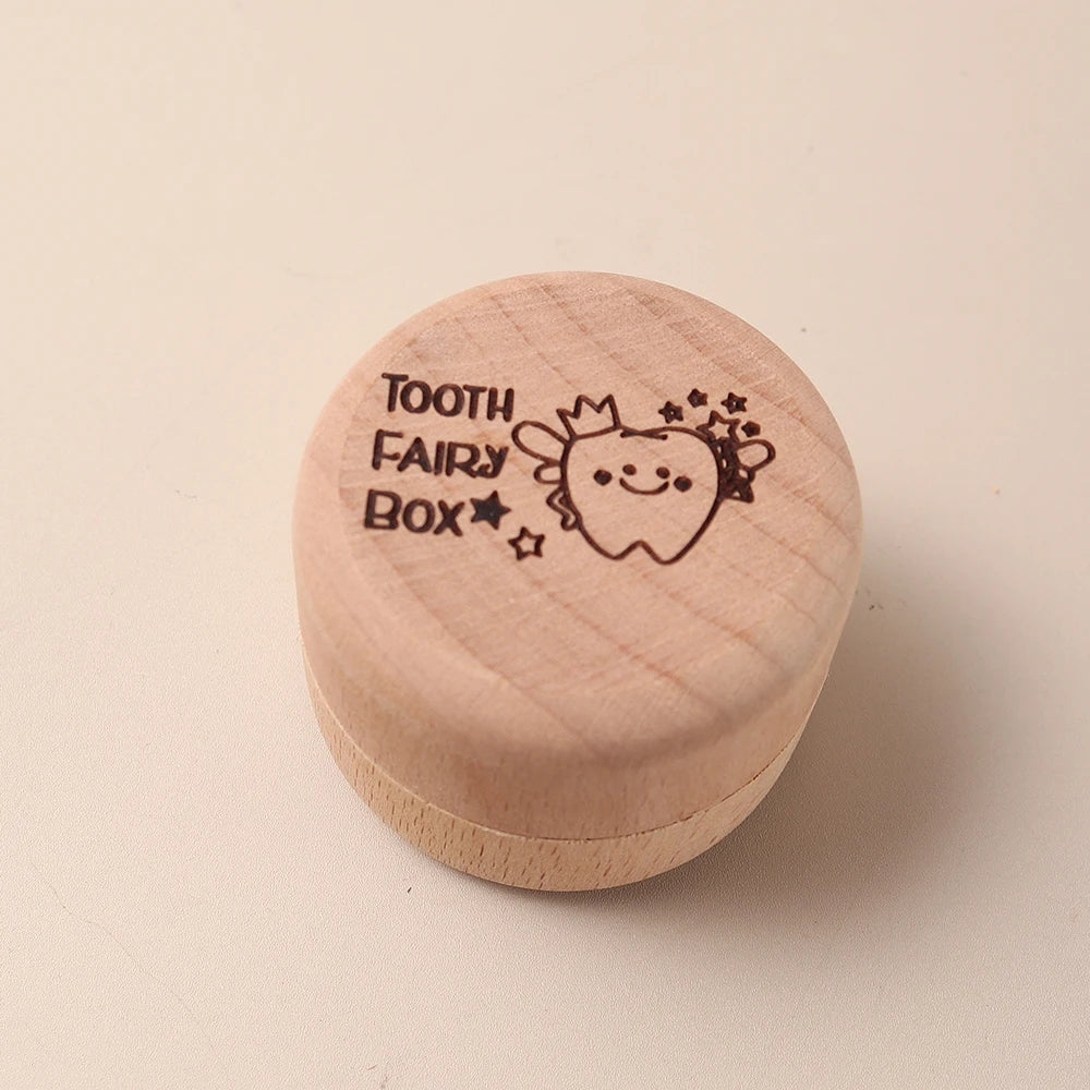 Natural beech wood tooth fairy box with cute tooth character and stars.