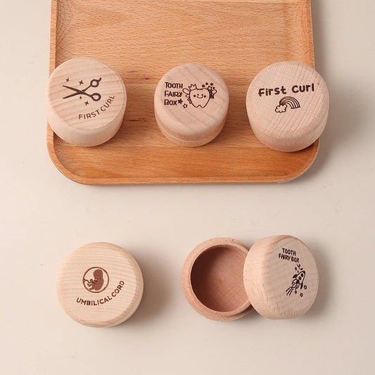 Set of five natural beechwood keepsake boxes for baby's first tooth, curl, and umbilical cord.