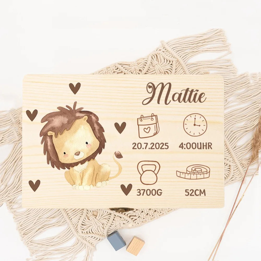Personalized wooden baby memory box with lion design, name "Mattie", birth date, time, weight, and height.