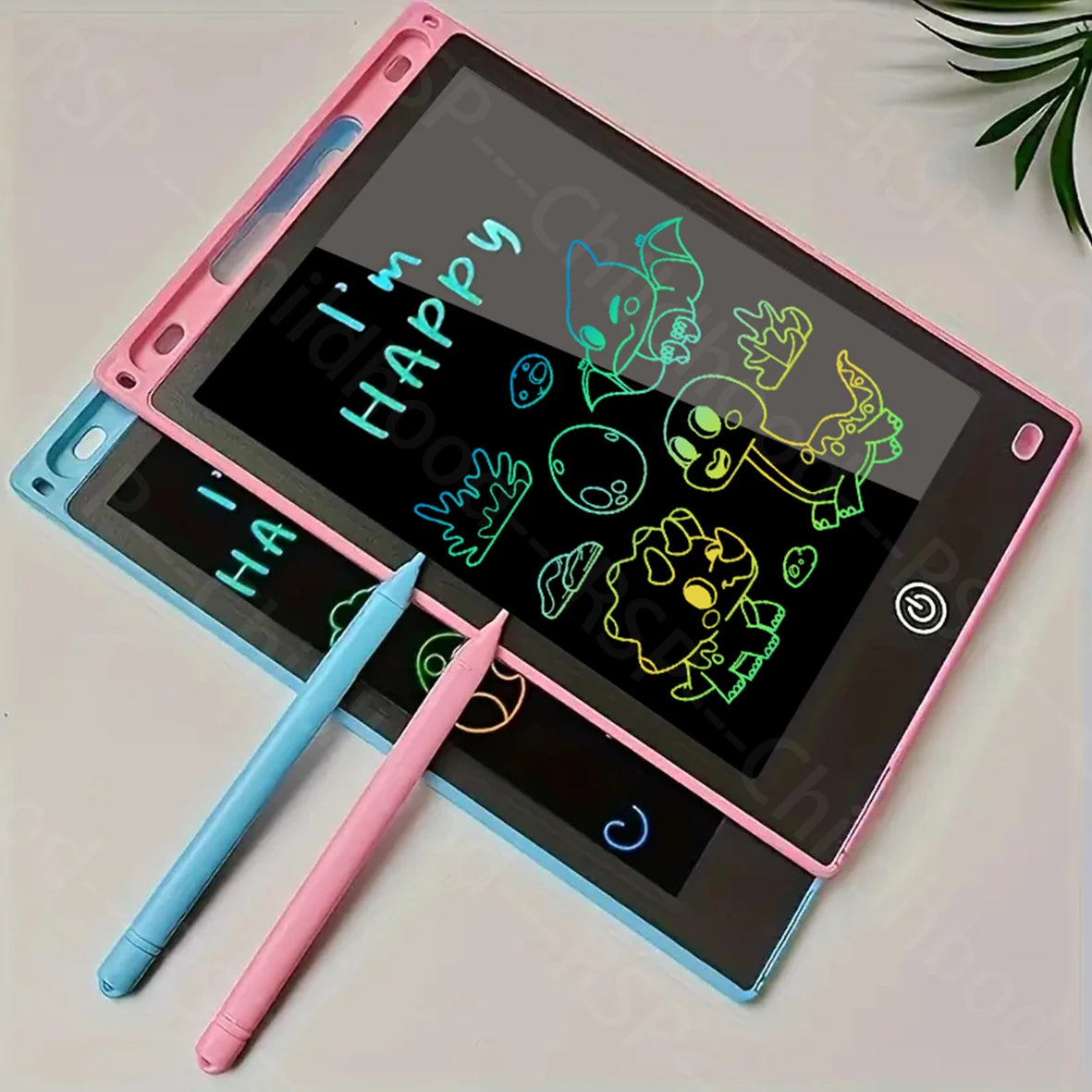 Two 8.5-inch LCD digital drawing tablets, one pink and one blue, with styluses and colorful doodles.