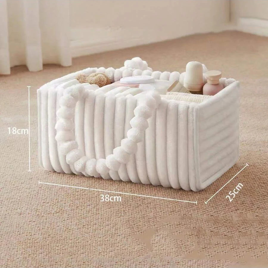White flannel diaper caddy with soft ribbed texture, handles, and compartments, measuring 38x25x18cm.