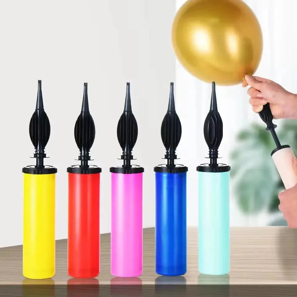 Colorful manual balloon pumps in yellow, red, pink, blue, and light blue, with one inflating a gold balloon.