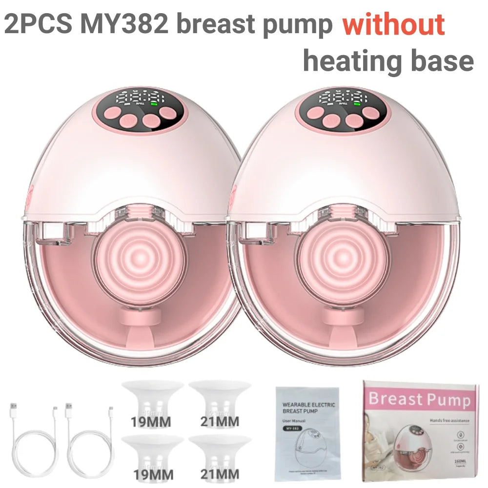 Two pink and white wearable electric breast pumps with digital displays, plus accessories.