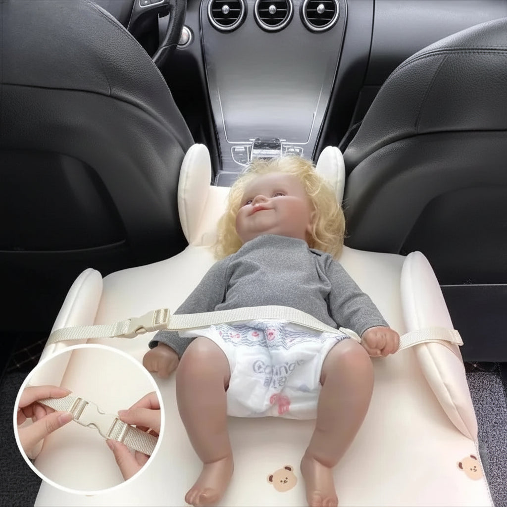Beige foldable baby changing pad for car back seat with reinforced buckle and cute bear design.