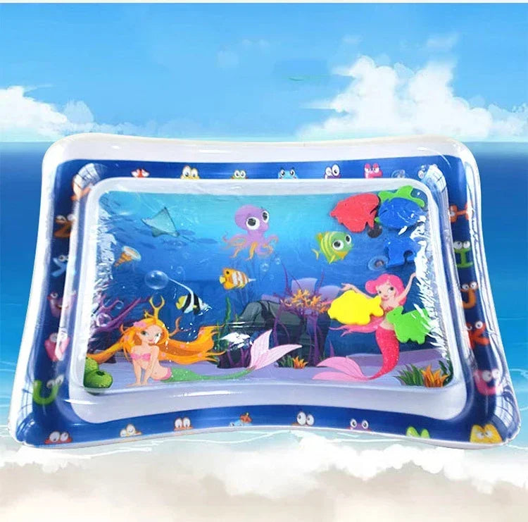 Inflatable baby water play mat with colorful floating sea creatures and mermaids, promoting sensory and motor development.