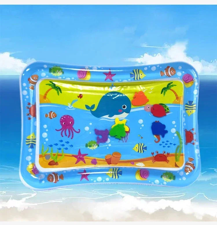 Blue inflatable baby water play mat with colorful floating sea animals for tummy time.