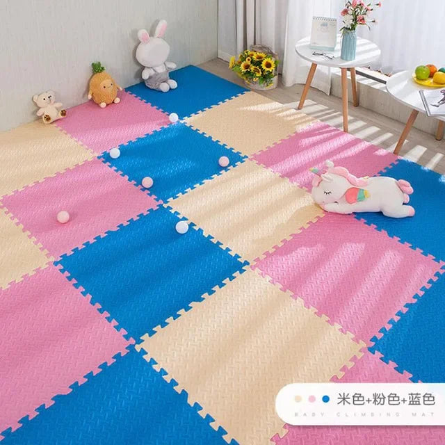 Colorful EVA foam puzzle play mat in blue, pink, and beige, with soft texture for babies.