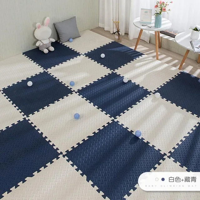 Blue and white interlocking foam puzzle play mat for babies, 16 pieces, with textured surface.