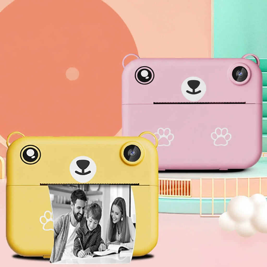 Yellow and pink bear-shaped instant print cameras for kids, printing black and white photos.